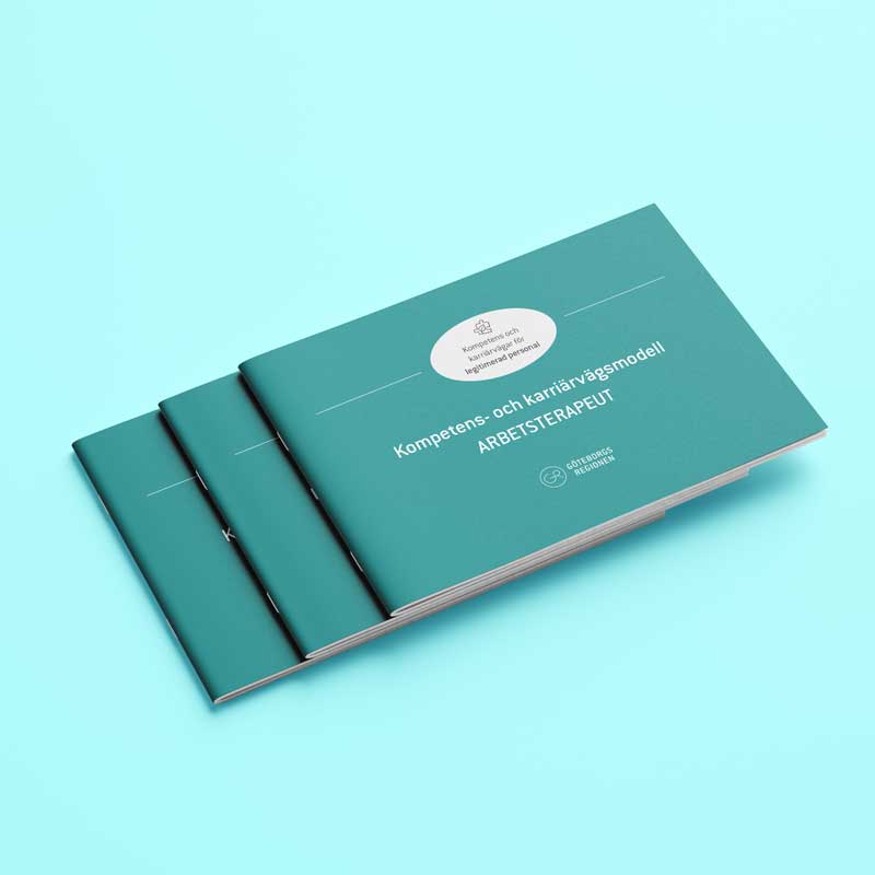 En fotoillustration av en utskriven PDF av karriärvägsmodellen för arbetsterapeuter.